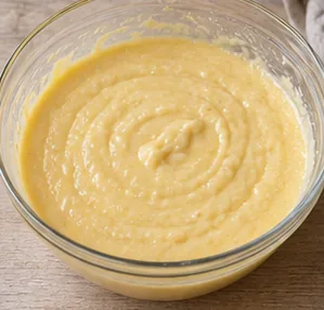 Gâteau à l’orange : terminer la pâte — Pâte homogène sans farine sèche.